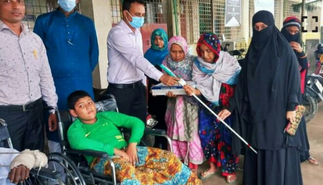 মাধবপুরে অসচ্ছল প্রতিবন্ধীদের মাঝে হুইল চেয়ার বিতরণ